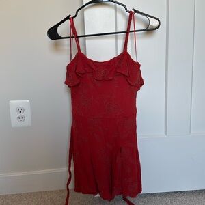 Francesca’s red romper